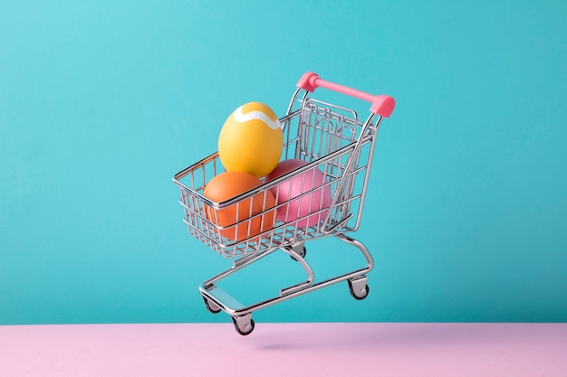 Close up on toy cart with easter eggs