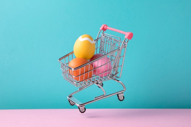 Close up on toy cart with easter eggs