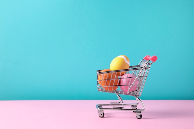 Close up on toy cart with easter eggs