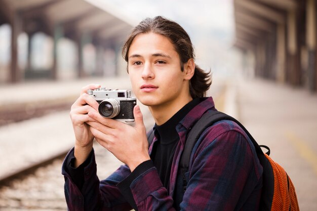 Free photo close-up traveler taking pictures
