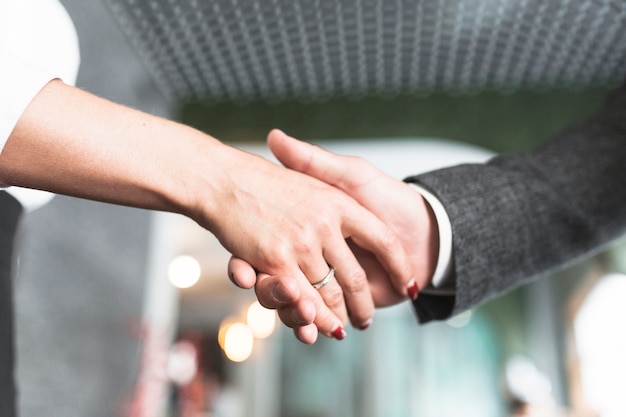 Close-up of two businesspeople shaking hands