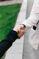 Free photo close-up of two businesswomen shaking hands