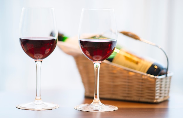 Close-up of two glasses with red wine