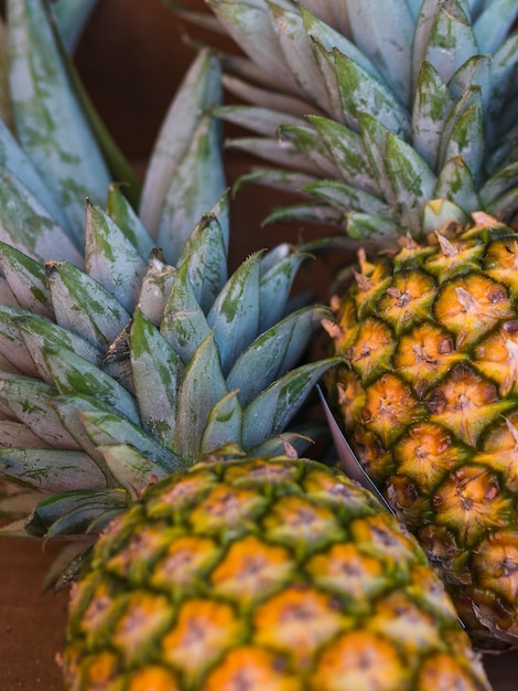 Close-up of two ripe whole pineapple