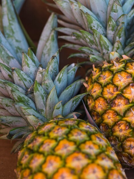 Close-up of two ripe whole pineapple