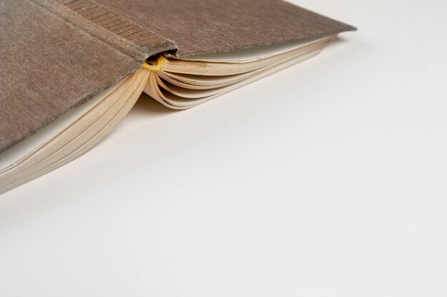 Close-up upside down book with white background