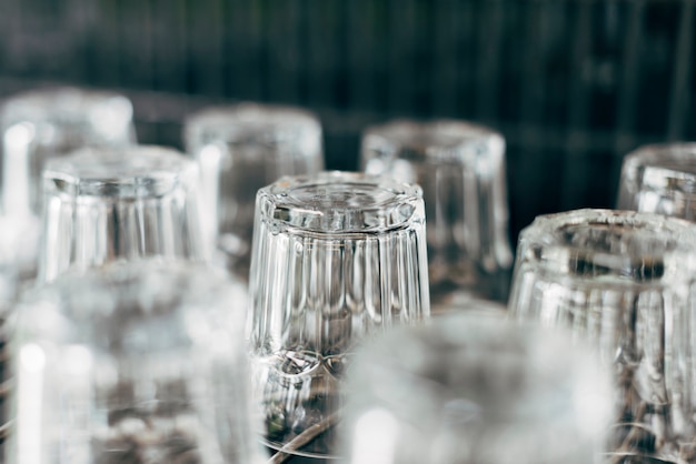 Close up of upside down glasses in a restaurant