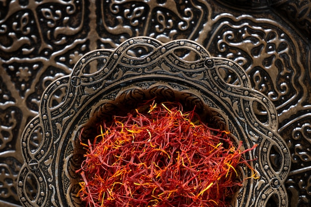 Close up on utensils full of saffron