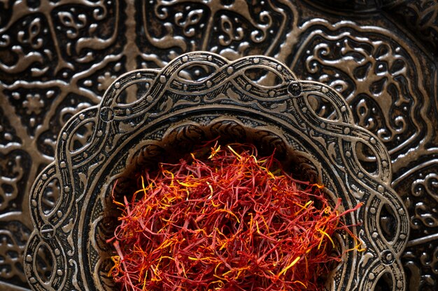 Close up on utensils full of saffron