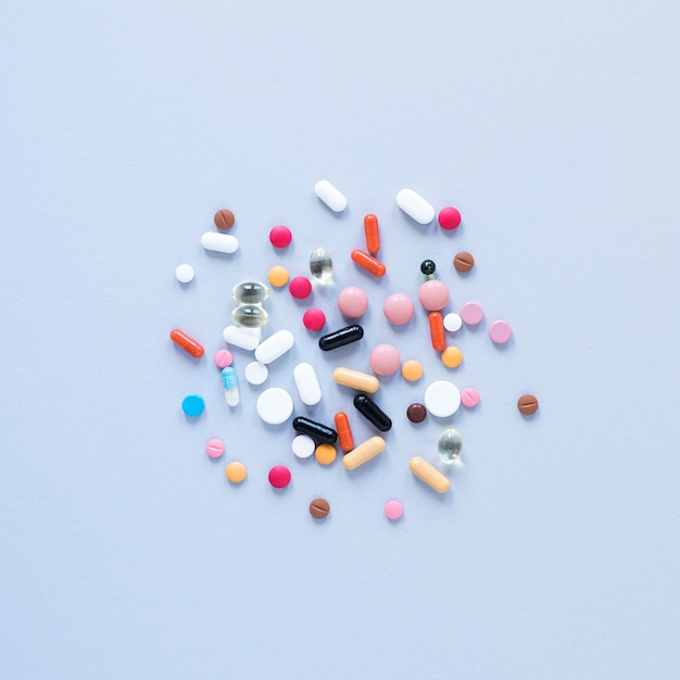 Close-up variety of colorful painkillers on the table