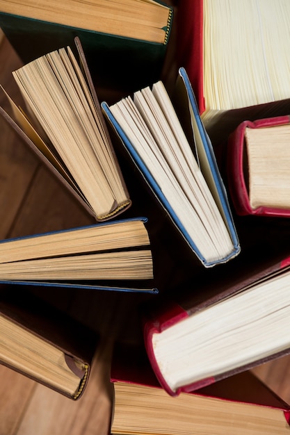 Close-up of various book on a desk