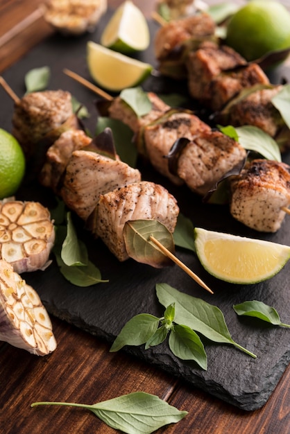 Close-up vegetables and meat skewers