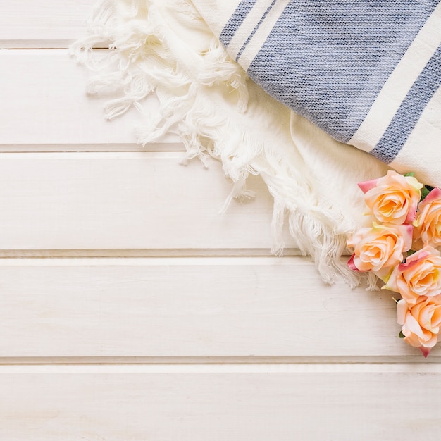 Close up view autumn decoration with roses and cloths