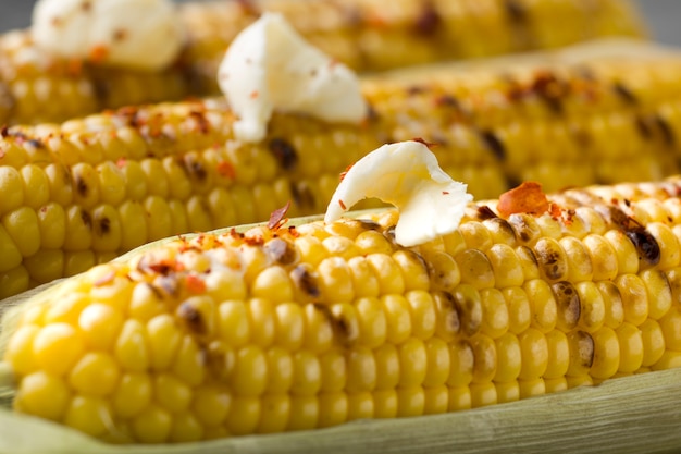 Close-up view of baked corn with butter