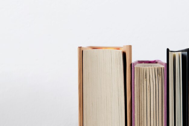 Close-up view of books with plain background