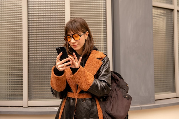 Close up view of caucasian woman looking at phone