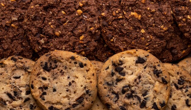 Close up view of chocolate chip cookies with cereals nuts and cocoa