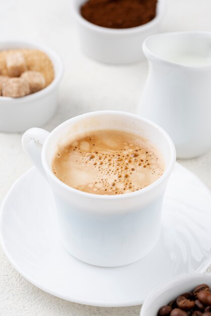 Close-up view of coffee in white cup