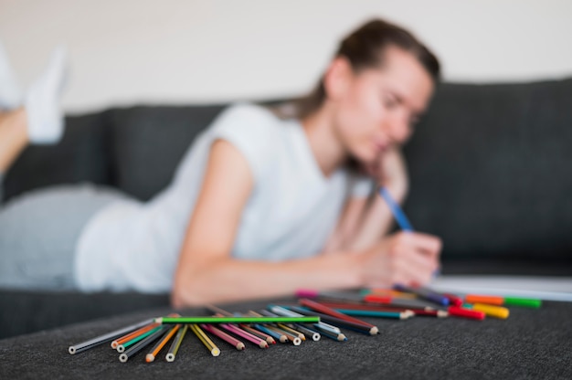 Close-up view of colorful pencils on desk