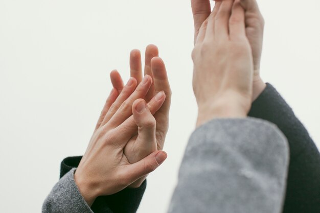 Close-up view of couple hands concept