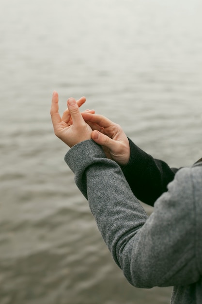 Close-up view of couple holding hands