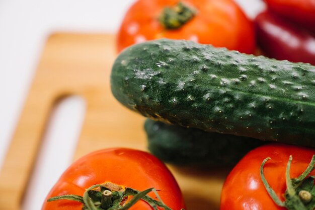 Close up view of cucumber and tomatoes