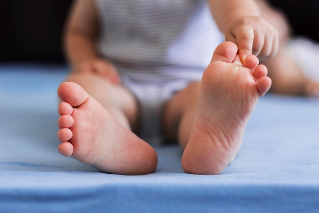 Free photo close-up view of cute baby legs