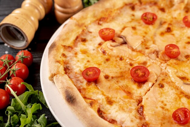 Close-up view of delicilous pizza on wooden table