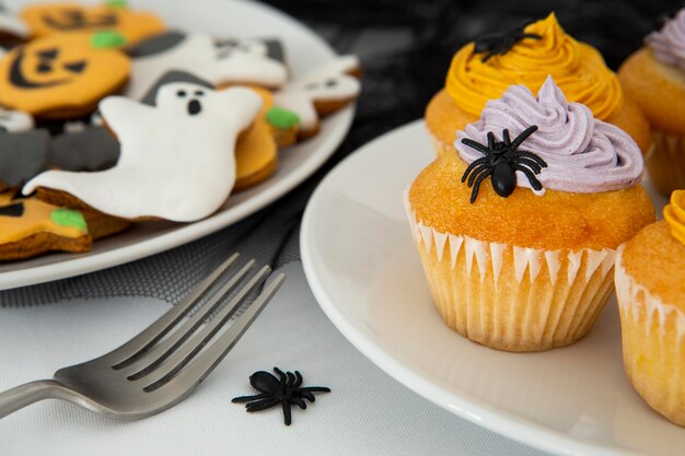 Close-up view of delicious halloween cupcakes