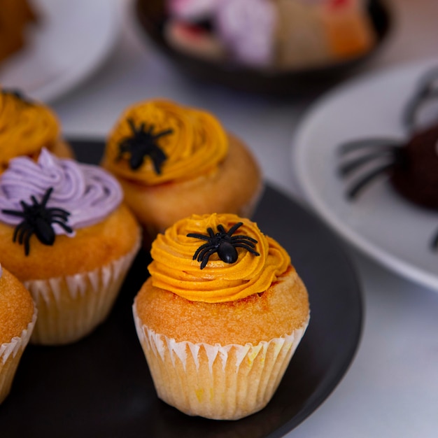 Close-up view of delicious halloween cupcakes