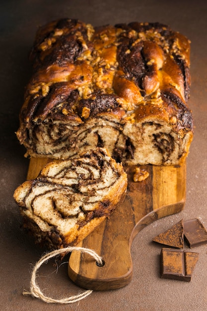 Close-up view of delicious sweet bread with coffee