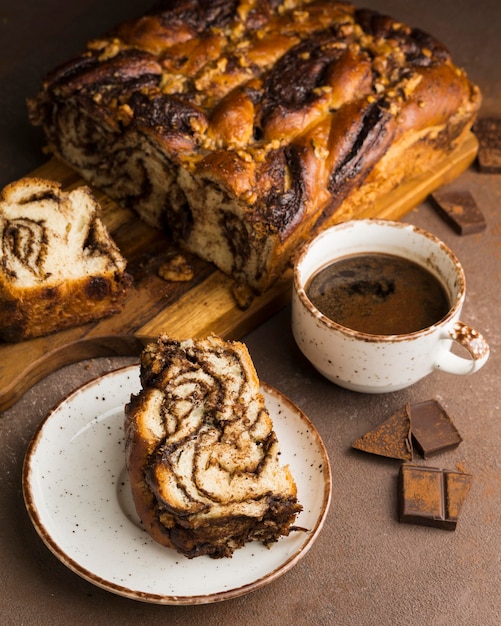 Close-up view of delicious sweet bread with coffee