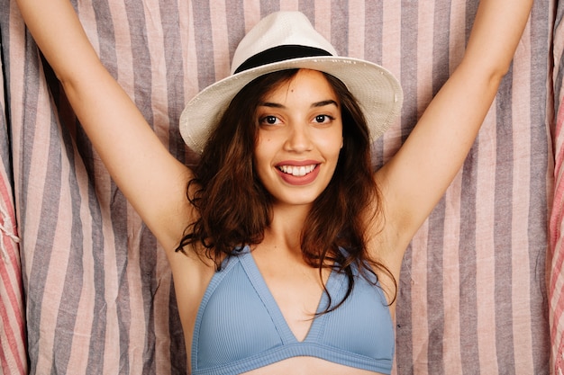 Free photo close up view of girl in bikini with towel