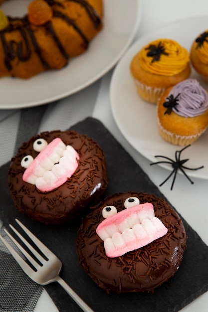 Close-up view of halloween donuts concept