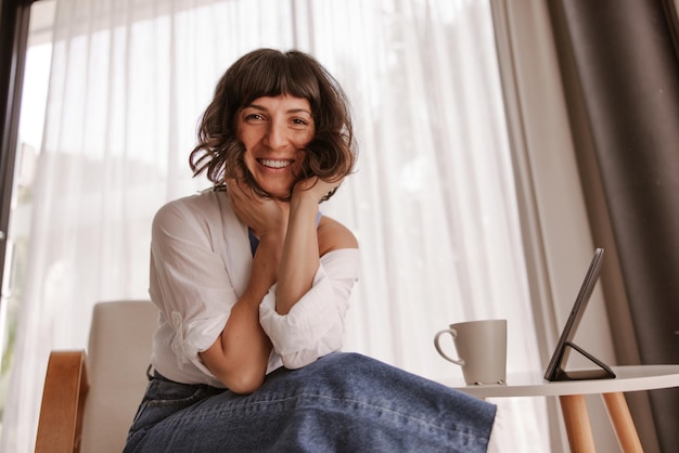 Close up view of happy woman smiling at camera