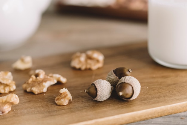 Close up view of hazelnuts and walnuts