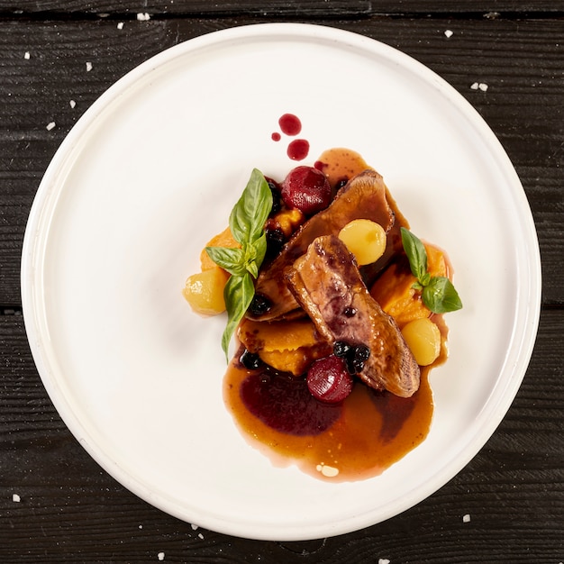 Close-up view of italian food on wooden table