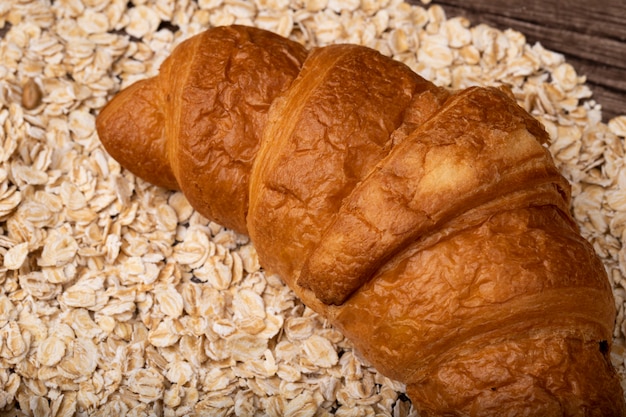 Close-up view of japanese butter roll on oat background