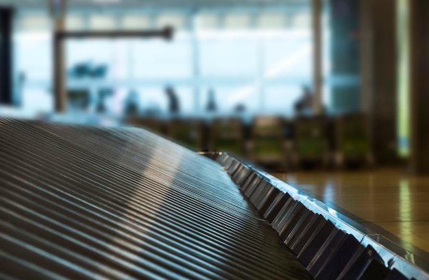 Free photo close-up view of a luggage treadmill