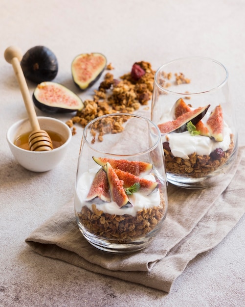 Close-up view of muesli with figs in glass