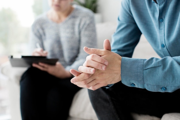 Close-up view of patient and psychologist