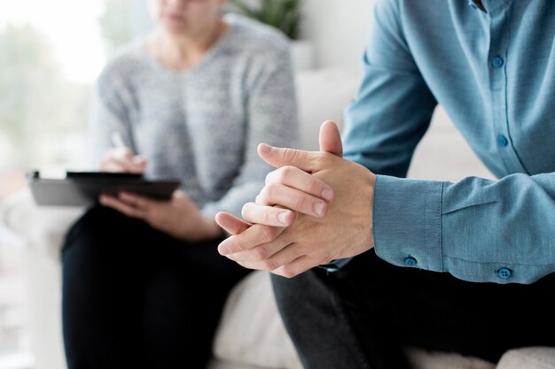 Close-up view of patient and psychologist