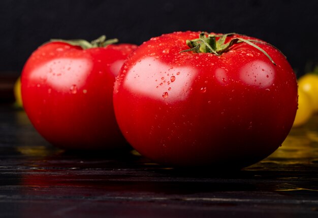 Close-up view of tomatoes on wooden surface