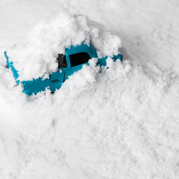 Close-up view of toy car in snow