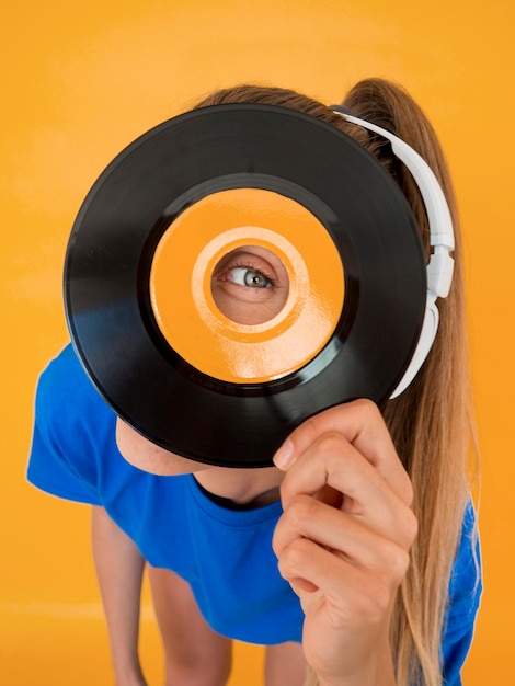 Close-up view of vinyl and woman