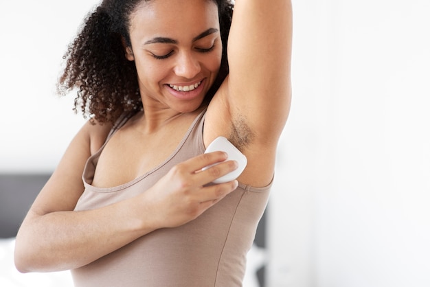 Free photo close-up view of woman removing armpit hair