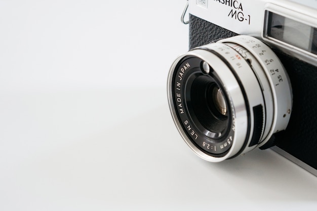 Close-up of vintage camera on white background