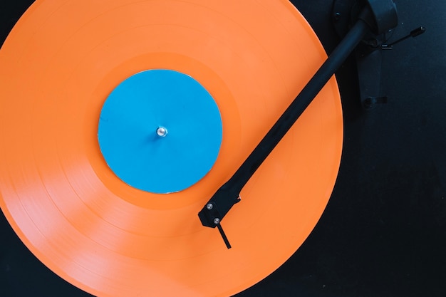 Close-up vinyl disc on record player