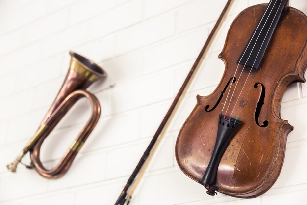 Close-up of violin and trumpet