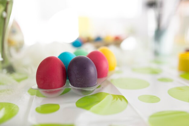 Close-up of vivid eggs in box